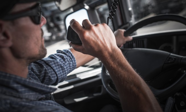 trucker driving talking on cb radio